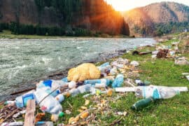 Plastic,Garbage,On,The,Mountain,River,Bank