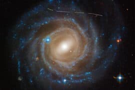 2024/04/Galaxy-UGC-12158_asteroid-photobomb_hubble_NASA_1m.jpg