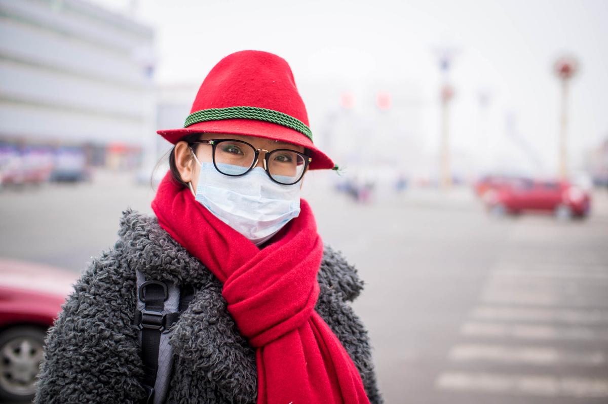 Haze plays a crucial role in warming of Chinese cities