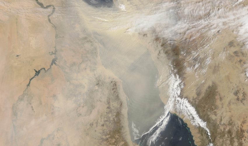 Wind currents carry a plume of dust over the Red Sea