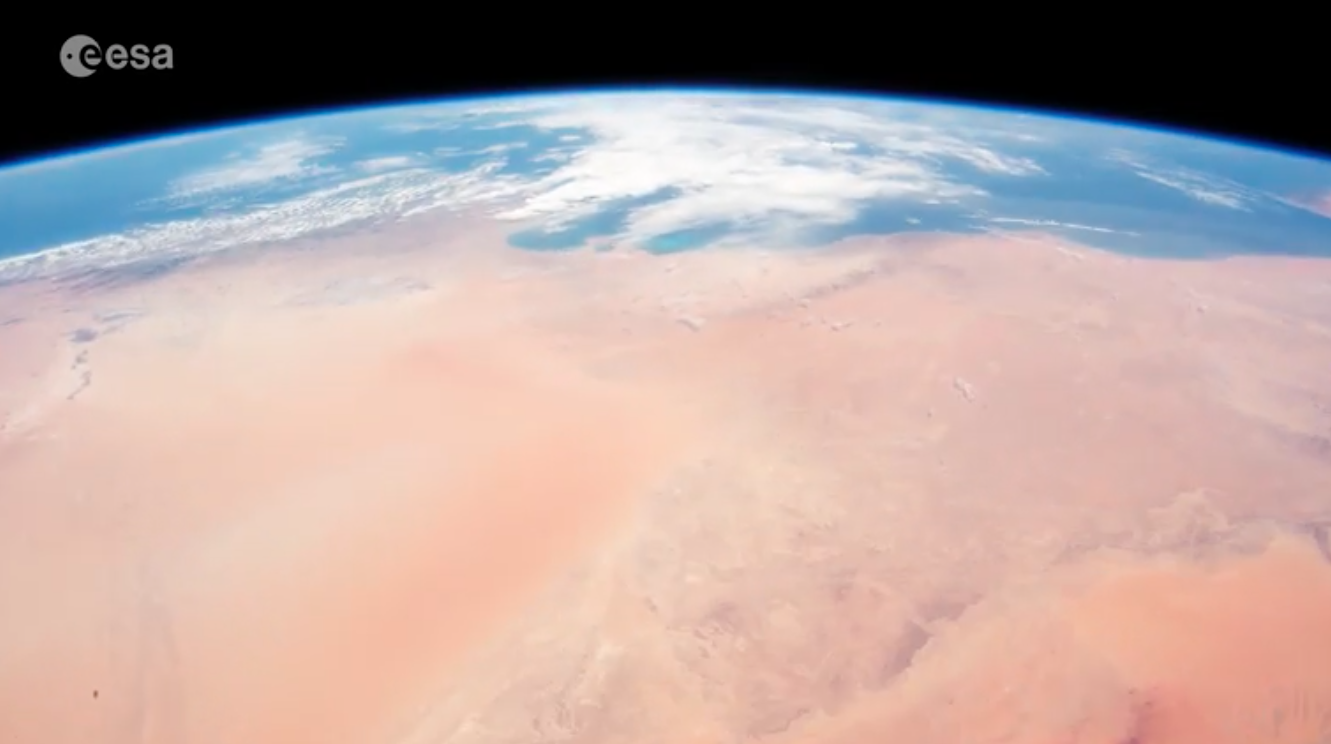Planet Earth: desert, water, and clouds