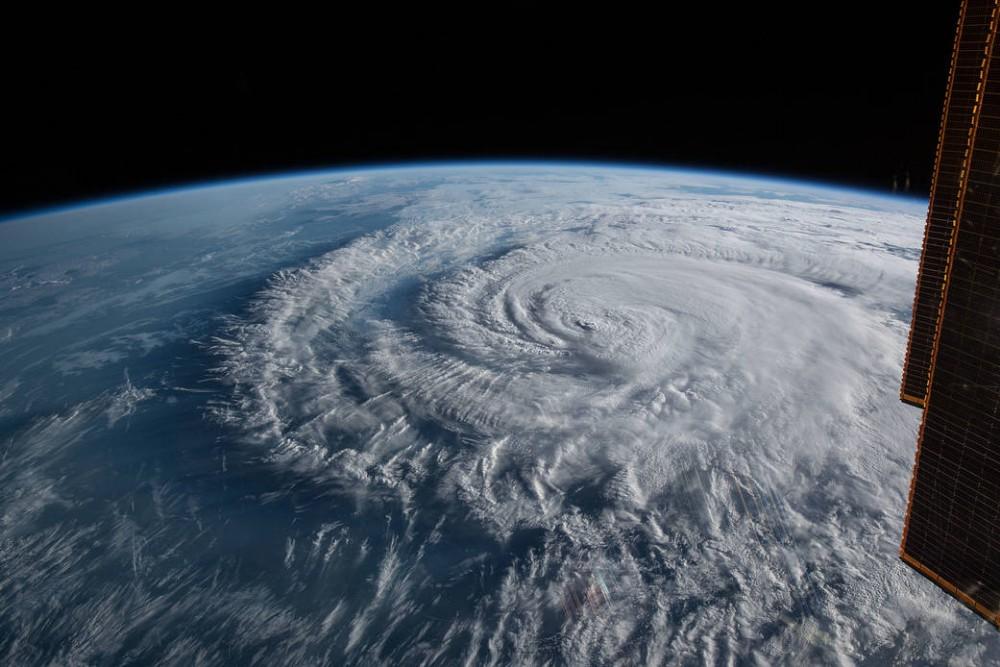 Death toll rises as Tropical Storm Florence hovers over Carolinas