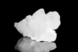 Baryte gemstone, black and reflection, mineral healing stone