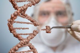 Scientist is replacing part of a DNA molecule. Genetic engineeri