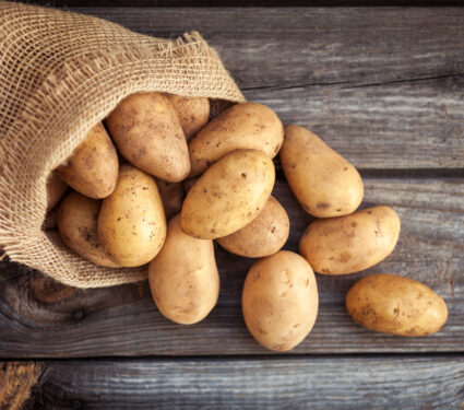 Raw,Potato,Food,.,Fresh,Potatoes,In,An,Old,Sack
