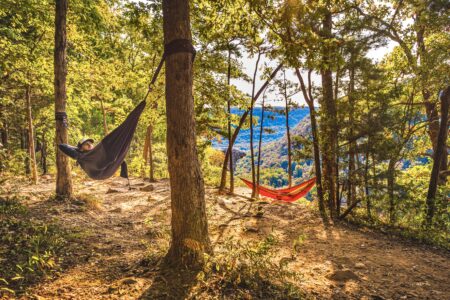 Two hikers hammock along Whitaker Point Trail