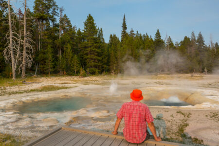 Tourist,In,Yellowstone,National,Park,,Usa