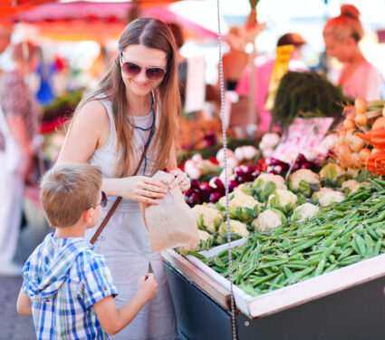 Mother,And,Son,Buying,Green,Peas,At,Market
