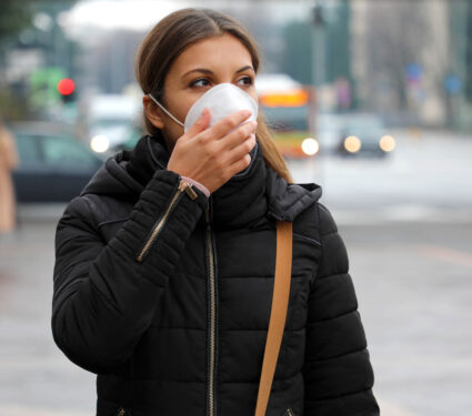 Covid-19,Pandemic,Coronavirus,Woman,In,City,Street,Wearing,Protective,Face
