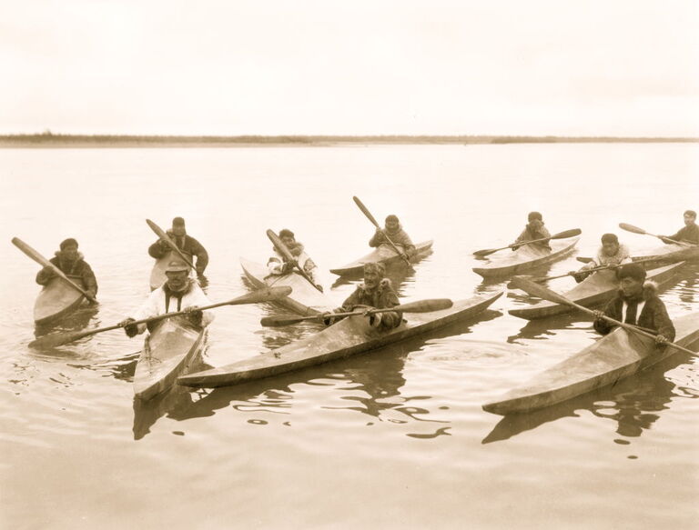 Iñupiats Riding in Kayaks