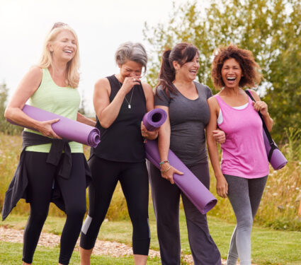 Group,Of,Mature,Female,Friends,On,Outdoor,Yoga,Retreat,Walking