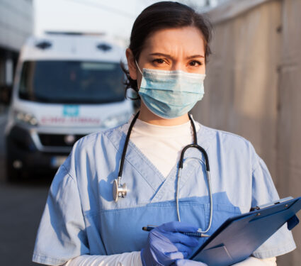 Young,Female,Nks,Uk,Ems,Doctor,In,Front,Of,Healthcare