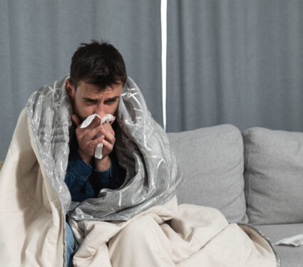 Young,Man,Suffering,From,A,Common,Cold,And,Flu,Or