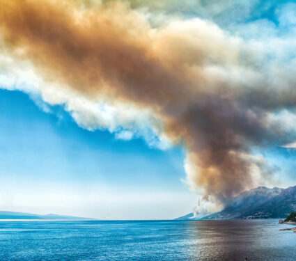 Dangerous,Dark,Red,Smoke,And,Dust,Over,The,Sea.,Burning
