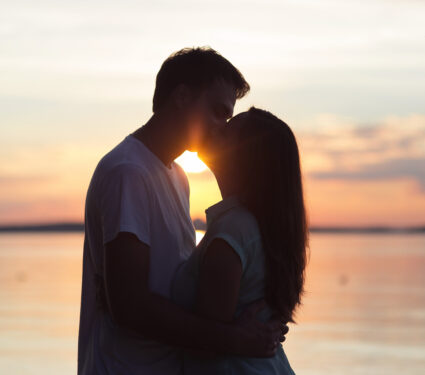 Loving,Couple,Kissing,At,Sunset.,Love,In,The,Sun.,Valentine's