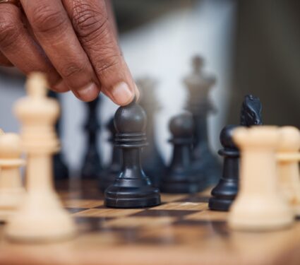 Man,,Chess,And,Hands,With,Bishop,On,Board,,Strategy,Challenge