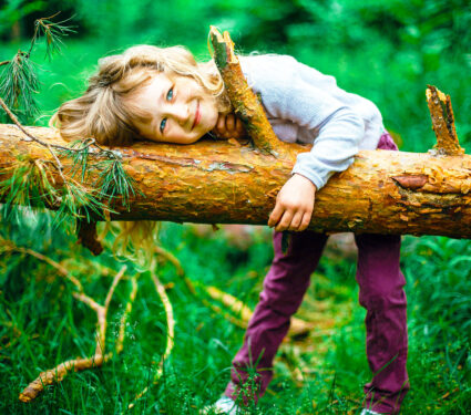 Cute,Little,Girl,Playing,In,Peaceful,Green,Park
