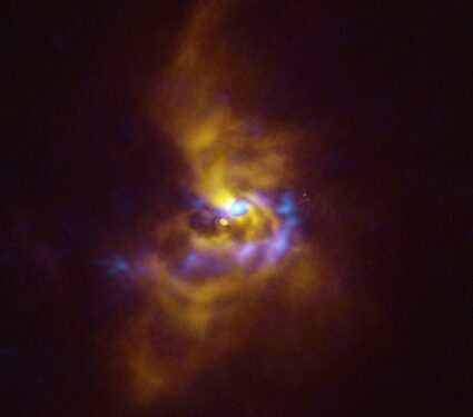 Combined SPHERE and ALMA image of material orbiting V960 Mon