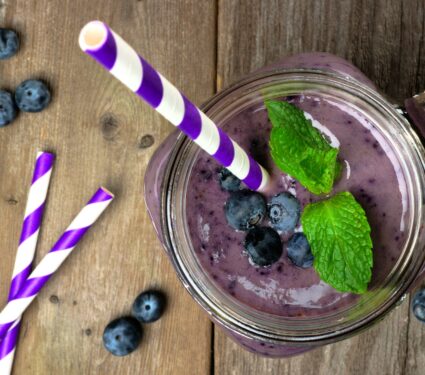 Blueberry,Smoothie,With,Mint,In,Mason,Jar,Mug,With,Straw.
