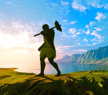 Primitive,Man,Silhouette,Against,The,Sun.