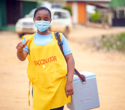 Image,Of,African,Lady,In,Face,Mask,With,Thumbs,Up-child
