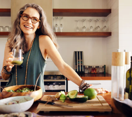 Healthy,Senior,Woman,Smiling,While,Holding,Some,Green,Juice,In