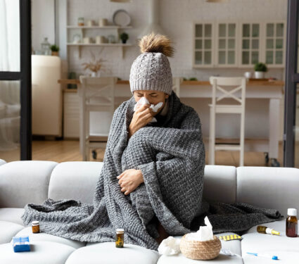 Unhealthy,Woman,Sit,In,Blanket,Hat,Feel,Sick,Suffer,From