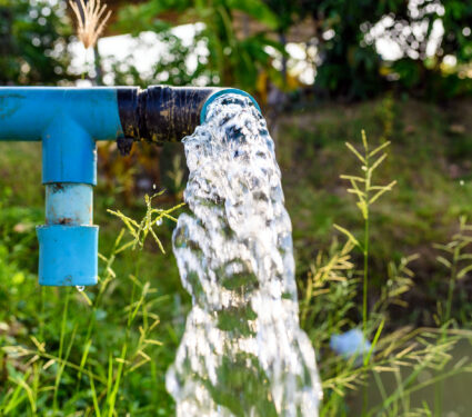 Agriculture,Blue,Pipe,With,Groundwater,Gushing