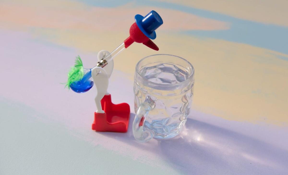 Transforming the drinking bird toy into a power generator
