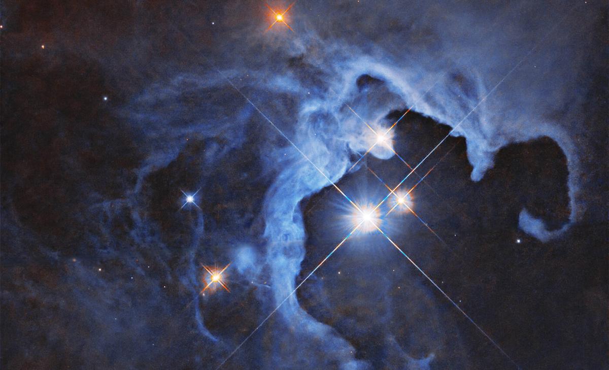 Birth of a Sun-like star, HP Tau, seen through the eyes of Hubble