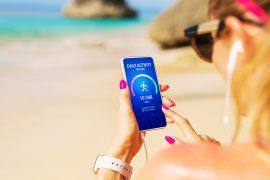 Woman,Using,Daily,Activity,Tracking,App,On,Mobile,Phone,Showing
