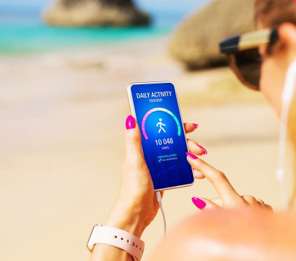 Woman,Using,Daily,Activity,Tracking,App,On,Mobile,Phone,Showing