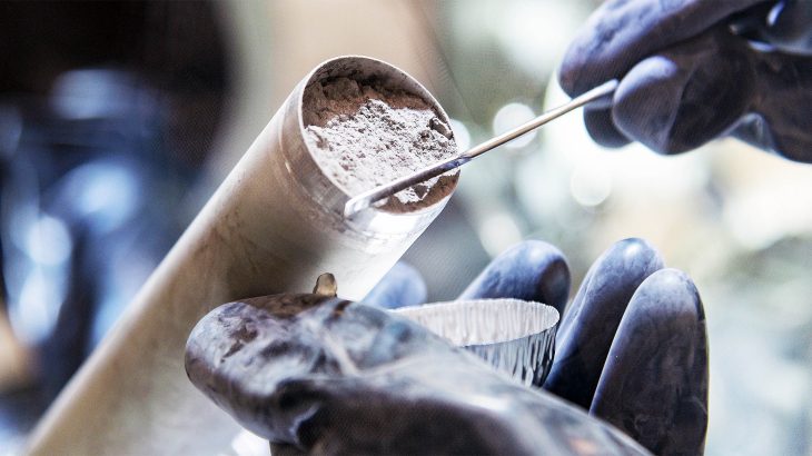 Signatures of an exotic element discovered when retesting Apollo moon samples