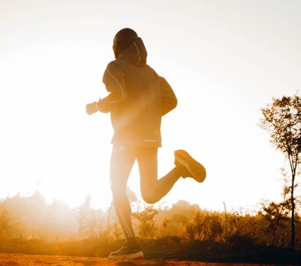 Silhouette,Of,A,Kenyan,Runner,Running,Along,A,Red,Dirt