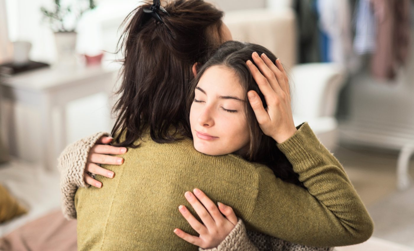 Why warm hugs and natural skin cues make us feel good
