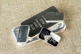 Several,Silver,Bars,Against,The,Background,Of,The,Texture,Of