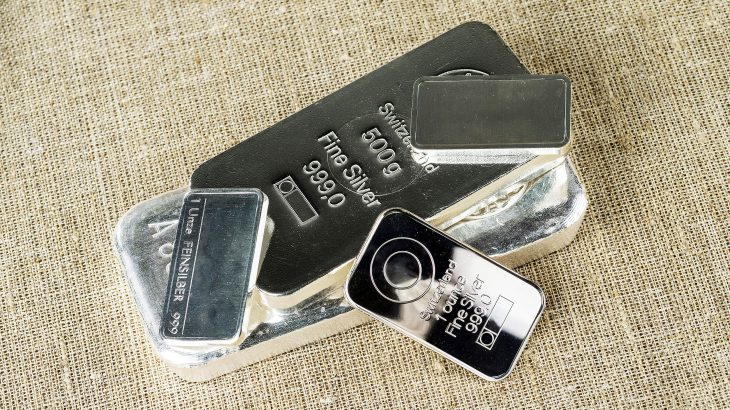 Several,Silver,Bars,Against,The,Background,Of,The,Texture,Of