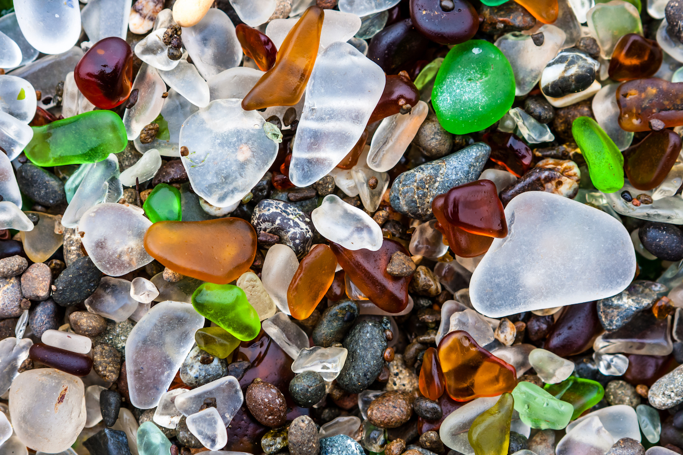 Beach glass, river rocks, and dune sands all form the same way
