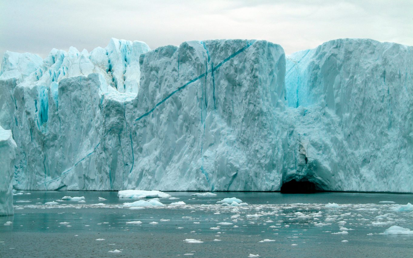 What makes ice melt so rapidly off the coast of Greenland?
