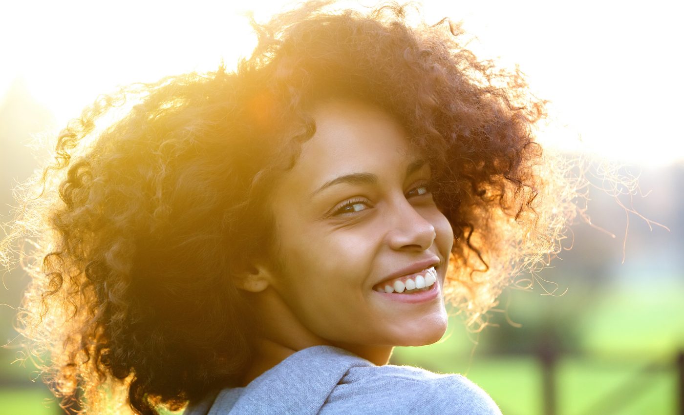 Smiling really can make you feel happier, research shows