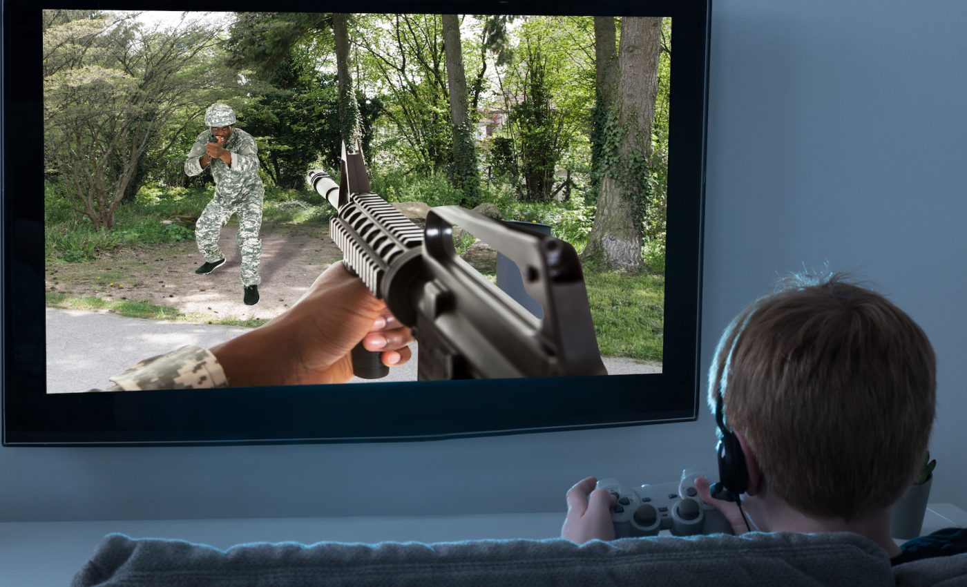 Violent video games may make kids more comfortable handling guns