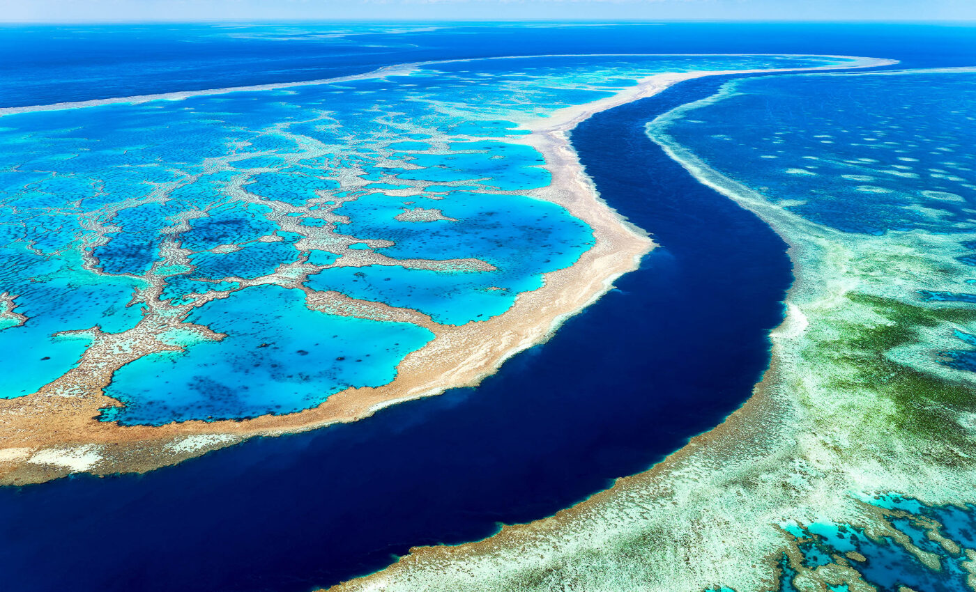 Deeper zones of global coral reefs are currently safe from warming waters
