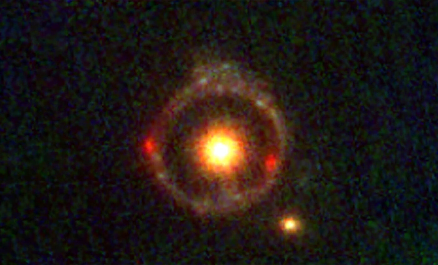 Dark matter and Einstein rings solve ancient galaxy mystery