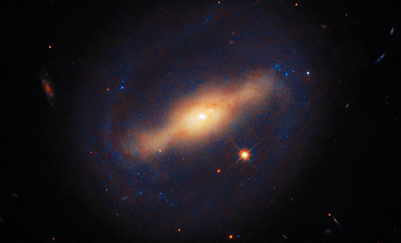 Galaxy resembling a Star Wars 'TIE fighter' captured by Hubble