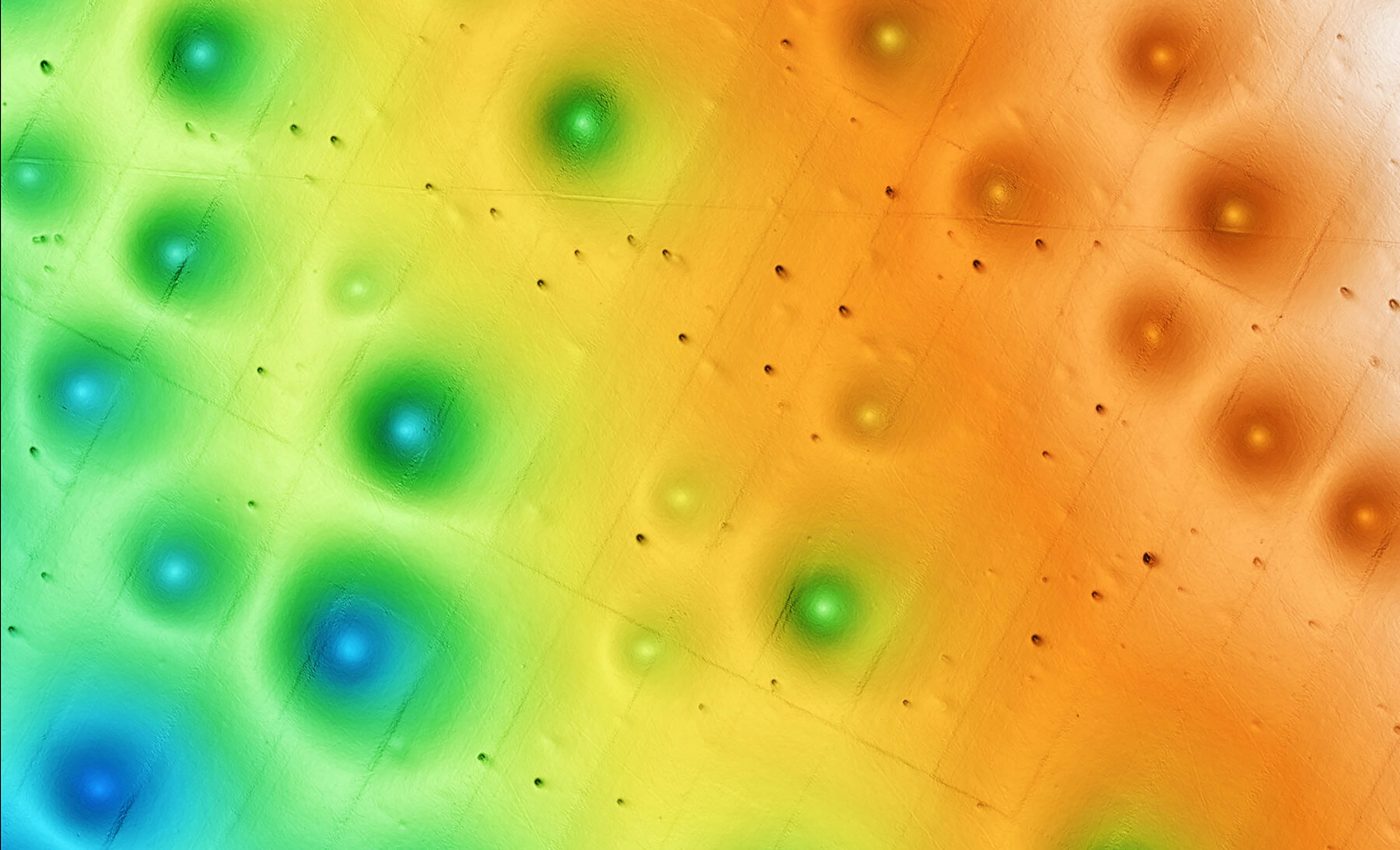 Thousands of enormous holes discovered on the seafloor, evenly-spaced with "eerie regularity"
