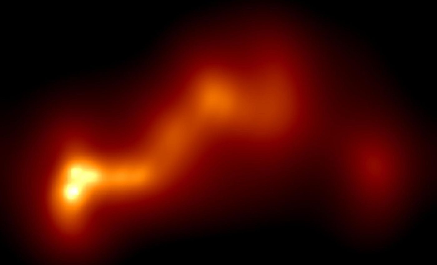 Massive plasma jet reveals the merger of two supermassive black holes