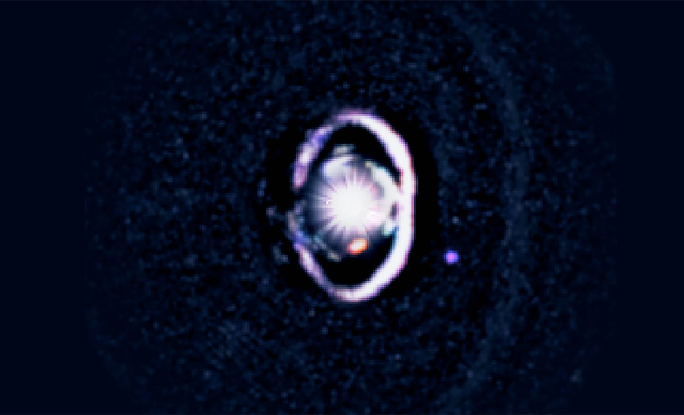 Baby planet photographed forming in a dust disk, while orbiting a star, for the first time ever