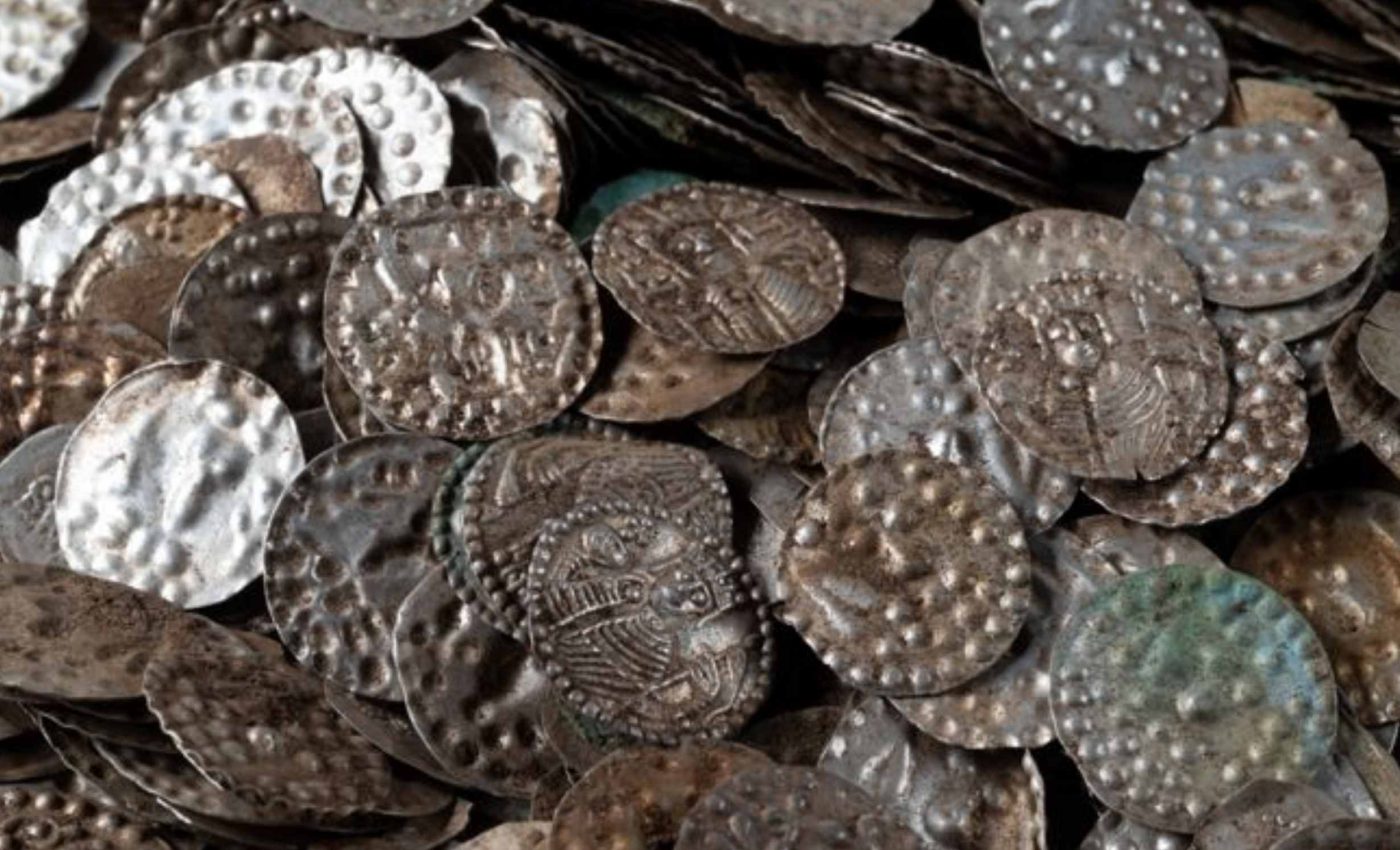 Man finds medieval treasure trove containing more than 20,000 silver coins